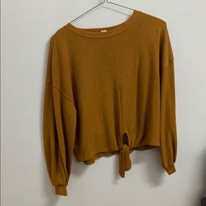 Golden toned blouse with tie front